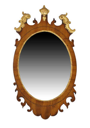 
	
		A George II mahogany wall mirror, c.1745, with gilt urn and C-scroll cresting, with...