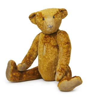 
	
		A Steiff type ginger plush teddy bear, with long arms and legs, 53cm long

	

