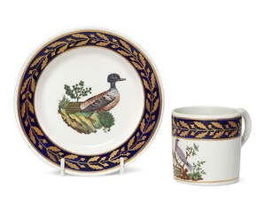 
	
		An English cabinet cup and saucer, 19th century, the rim of cup and saucer decorated with...