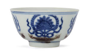 
	
		A Chinese porcelain underglaze blue and copper-red tea bowl, late Qing dynasty, decorated...