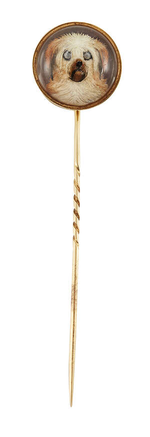 A late 19th century gold, reverse-painted crystal intaglio stickpin, the circular domed crystal painted to depict a dog's head, circa 1890, 21mm dia