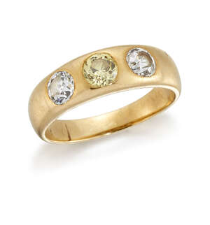 
	
		A pale yellow diamond and diamond three stone ring, in gypsy mount, the central pale...