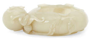 A Chinese green jade two-section brushwasher, late Qing dynasty, carved as two globular sections...