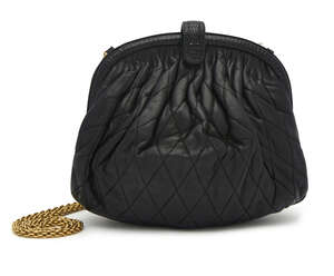 
	
		Chanel: a a black quilted and rouched lambskin clutch bag, with snakeskin trim and...