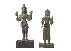
	
		Two similar Khmer bronze figures, 13th century, one depicting Parvati, the other...