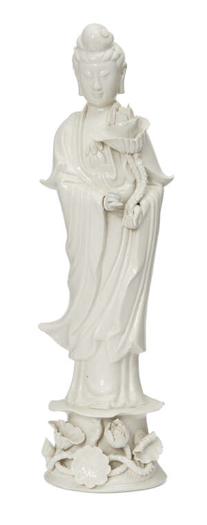 
	
		A Chinese porcelain blanc-de-chine figure of Guanyin, Republic period, modelled with long...