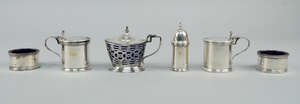 
	
		A five piece silver cruet set, Birmingham c.1931, Hasset & Harper Ltd., comprising a pair...