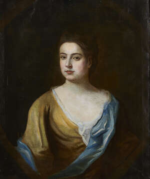 Follower of Sir Godfrey Kneller, 
		British 1646-1723- 
		Portrait of a lady, quarter length turned to the left, feigned oval; 
		oil on canvas, 75.8x63.5cm