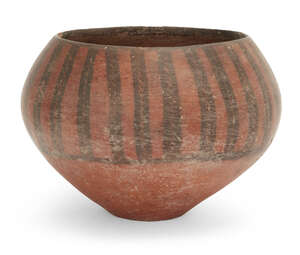 
	
		An Iranian pottery deep bowl
		Circa 4th-3rd Millennium B.C.
		the swollen body with...