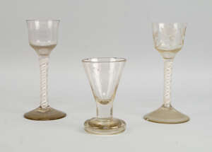 
	
		Two Georgian drinking glasses, each with tapering bowls, one engraved with flowers, on...