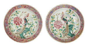 
	
		A pair of Chinese porcelain 'phoenix' plates, mid-19th century, painted in famille rose...