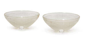 
	
		René Lalique (1860-1945), a pair of Coquilles  opalescent glass bowls  
		No.3203,...