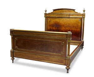 
	
		A French mahogany and gilt metal mounted double bed, late 19th Century, the shaped arched...