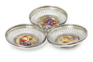 
	
		Three Royal Worcester circular porcelain plaques, painted with fruit by William Rickets,...