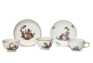 
	
		 A Berlin porcelain cup and saucer, late 19th/early 20th century, decorated with genre...