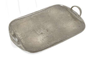 
	
		Liberty & Co., 
		 
		Tudric tray, model no.043, circa 1901, 
		Hammered pewter, 
		
