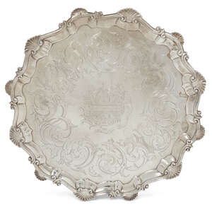 
	
		A George III silver salver, London, c.1762, Ebenezer Coker, raised on three scroll feet,...