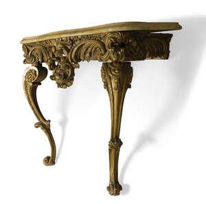 
	
		A Victorian giltwood console table, with serpentine yellow marble top, above elaborately...