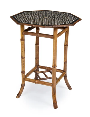 An Arts & Crafts ebony and mother of pearl inlaid bamboo octagonal occasional table, last quarter 19th century, 73cm high, 56cm wide, 56cm deep
Provenance: Su