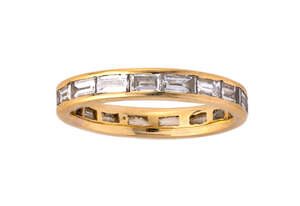 
	
		A diamond eternity ring, channel set with a single row of baguette diamonds, ring size...