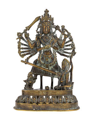 
	
		A bronze figure of Durga killing the buffalo demon, Nepal, late 19th-early 20th century,...