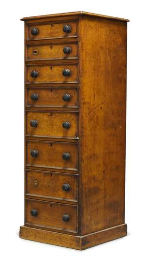 
	
		A Victorian oak Wellington chest, with eight graduated and cock beaded drawers, having...