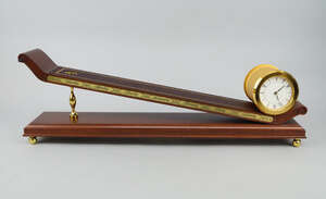 
	
		A Franklin Mint rolling plain clock, designed by the Musee International d' Horlogerie of...