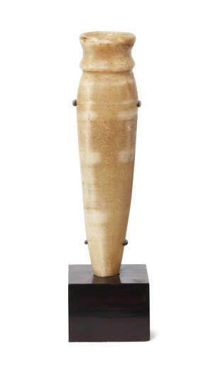
	
		An Egyptian pointed alabastron with ribbed rim, Middle Kingdom Period, 2050-1710BC.,...