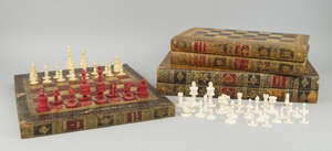 
	
		An Anglo Indian ivory chess set, Rajasthan, early 20th century, with natural and red...