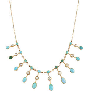 
	
		An Edwardian turquoise and pearl fringe necklace, the fine link chain suspending ten...