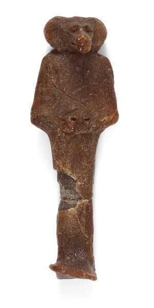 
	
		An Egyptian wax mummiform figure of one of the Four Sons of Horus, baboon headed Hapy, 3