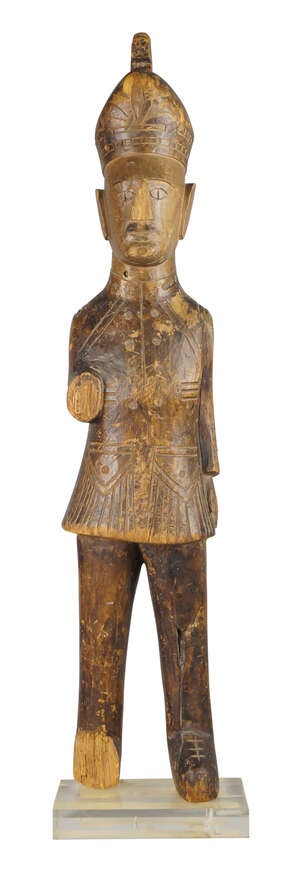 
	
		A carved wood fragmentary figure of a  Colonial soldier, early 20th century, on later...