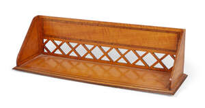 
	
		A Victorian satinwood bookstand, late 19th century, the trellis panel back inlaid with...