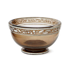 
	
		Daum, an enamelled smoky glass bowl 
		c.1920, signed Daum Nancy with Cross of...