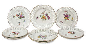 
	
		A set of six Meissen plates, late 19th century, with reticulated basket weave rims and...