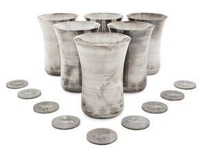 
	
		Six Indian silver water beakers, of waisted form, two with personalised engraving to lip,...