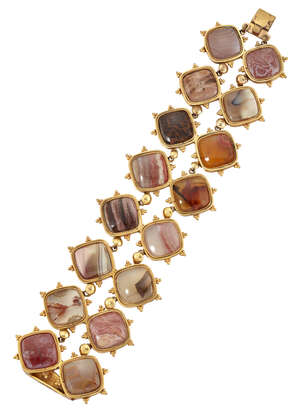 An 18th century gilt mounted hardstone bracelet, designed as two articulated rows of varicoloured agate lozenges to beaded, filigree mounts and gilt button spa