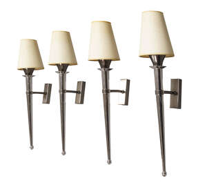 
	
		A set of four chromed wall lights in the manner of Tommy Parzinger  
		c.2000  
		Of...