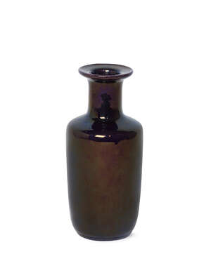 
	
		A Chinese monochrome porcelain rouleau vase, 19th century, with allover slightly...