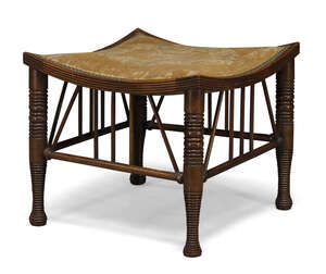 
	
		A stained beech 'Thebes' stool with upholstered seat 
		c.1900, unmarked, possibly a...