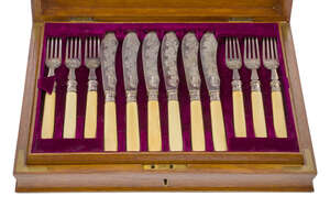 
	
		An Edwardian canteen of silver fish knives and forks, London, c.1902, William Hutton &...