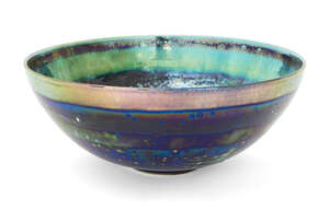
	
		Sutton Taylor, b.1943, a green and blue thrown earthenware bowl, 2002, decorated with...