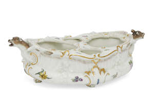 
	
		A Meissen porcelain boat shape condiment tray, 18th century, with moulded decoration of...