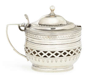 A George III silver mustard, London c.1803, Charles Fox I, of oval outline, the hinged cover with shell form thumb-piece, the body with pierced band, engraved 