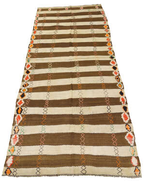 
	
		Moroccan, a wool rug
		Third quarter 20th Century
		Woven with alternating brown and...