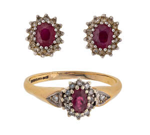 
	
		A ruby and diamond ring and pair of ear studs, cluster design each centring on an oval...