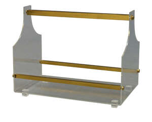 
	
		A Lucite and brass magazine rack,
		c.1960s
		34.5 cm high x 43 cm wide x 25.5 cm deep...