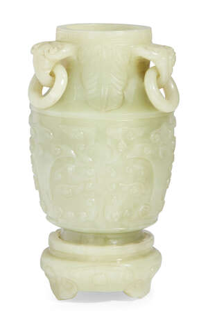A Chinese green carved hardstone archaistic vase and stand, 20th century, with three...