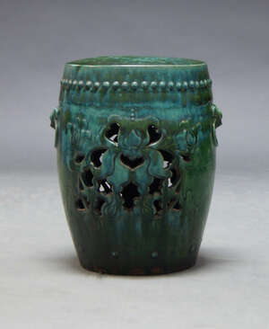 
	
		A Chinese green glazed stoneware barrel form garden seat, early 20th Century, with...
