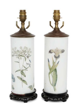 
	
		A pair of decalcomania cylindrical table lamps, early 20th century, decorated with...